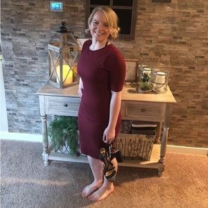 Mid form fitting maroon dress. Brand Love by Chesley